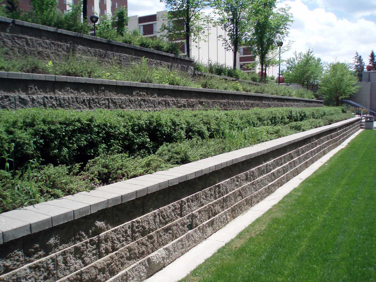 Cast-in-place retaining system at tech campus courtyard