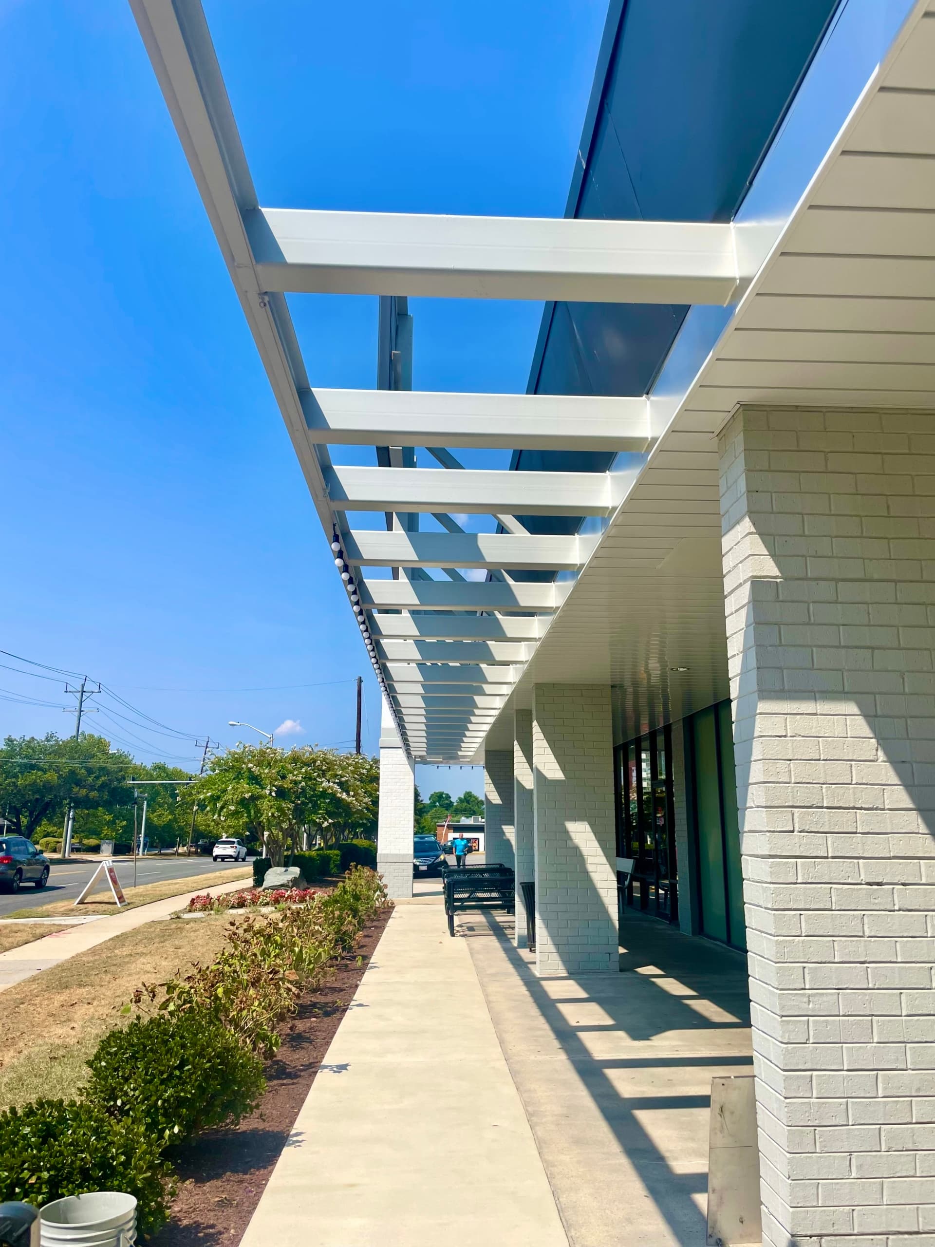 Decorative broom-finish walkway for retail plaza